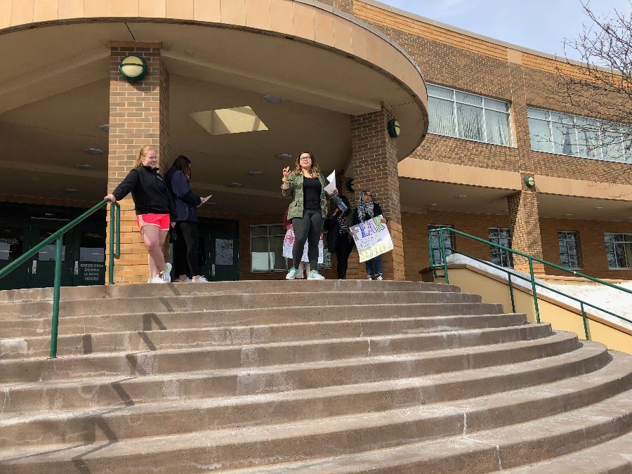 Leaders of the walkout begin to organize the crowd.