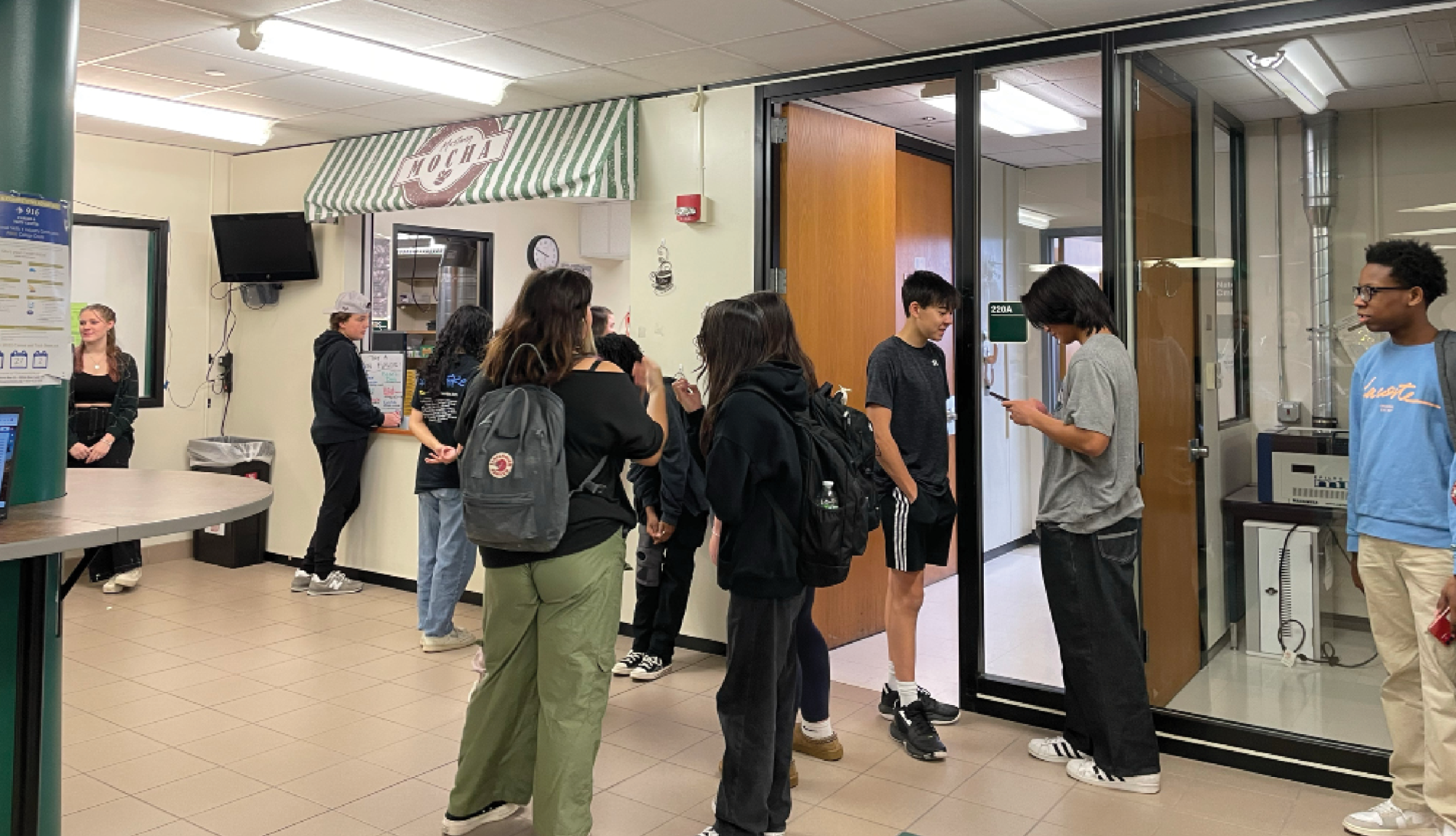 Students wait in line to get a drink at Mustang Mocha during ReFLECT.