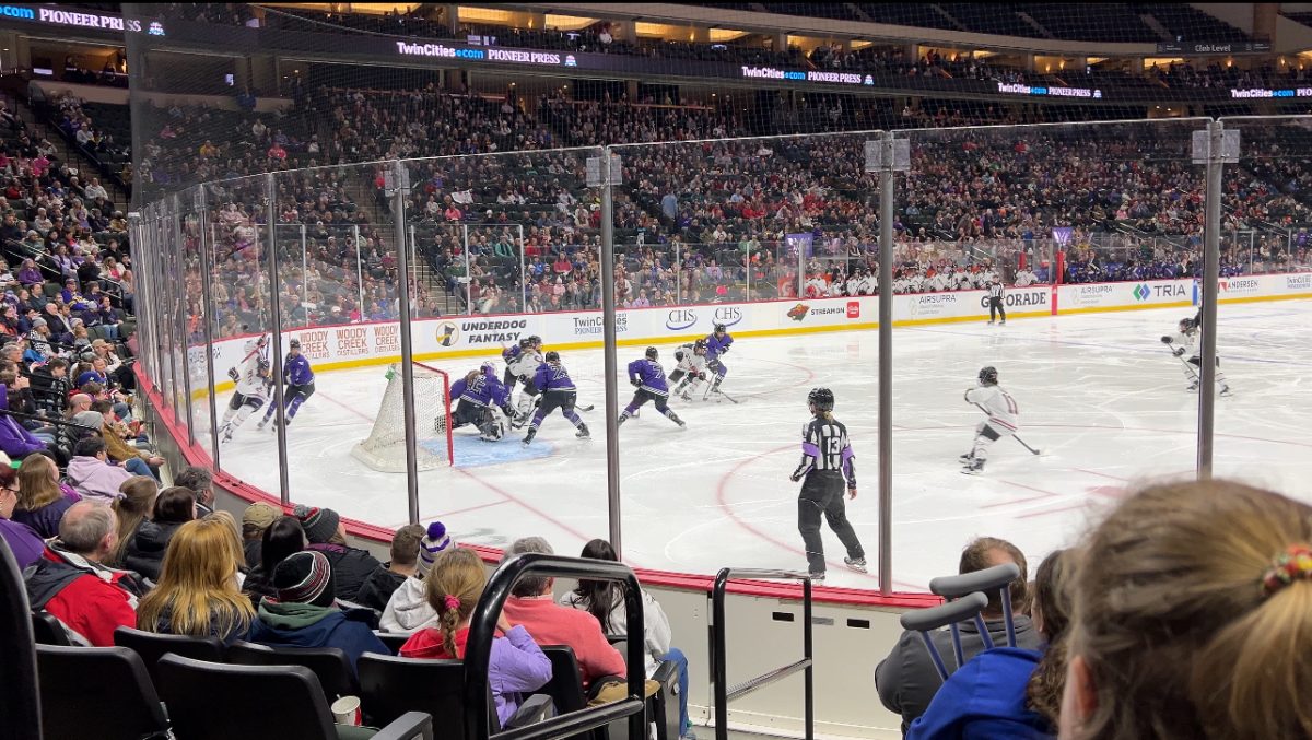 The stadium is packed as the Professional Womens Hockey League plays against Ottawa at Xcel Energy Center, winning with a score of 2-1.